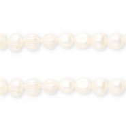 Imperfecte zoetwaterparels rond Natural white