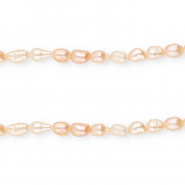 Imperfecte zoetwaterparels rice 4-7x4-5mm Peach rose