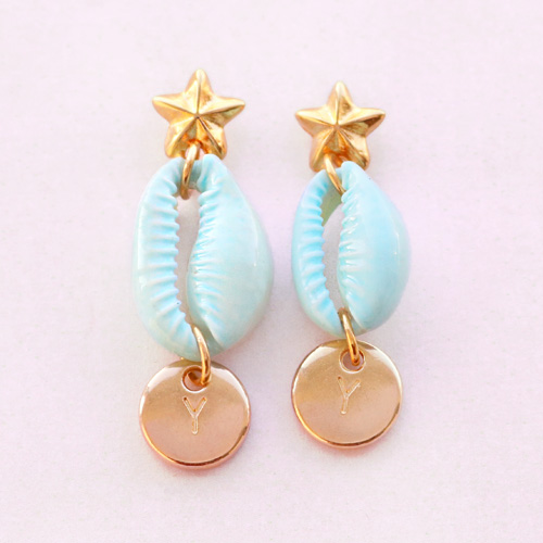 Tropische sieraden met kauri schelpjes