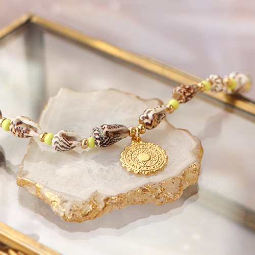 Idee&euml;n voor strandlook met DQ metalen kralen en bedels