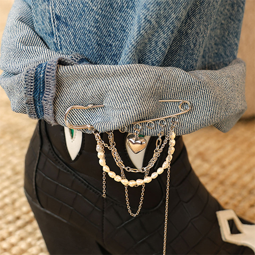 Tips voor het ontwerpen met sierspelden met oogjes