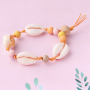 Beachy sieraden met houten kralen, schelpen en DQ metaal!